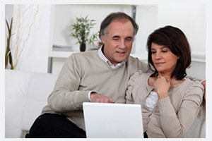 couple with computer